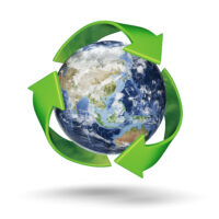 A 3D Rendering of Earth surrounded by the recycle symbol with Clipping Path